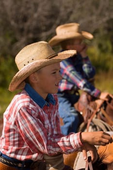 Two boys on horses