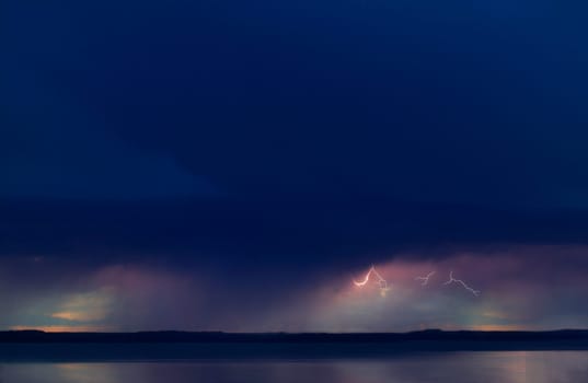 Lightning in sky over water