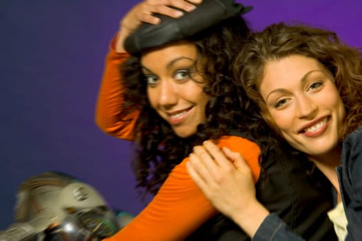Two women on a motorcycle