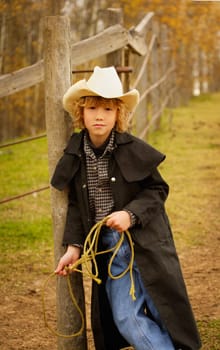 Portrait of young cowboy