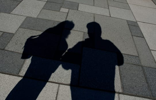Shadow of two people standing