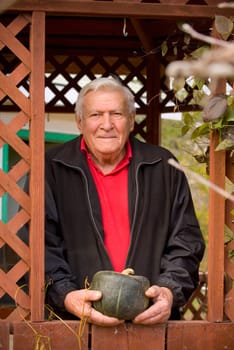 A senior with a squash