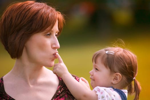 Mother and child play together