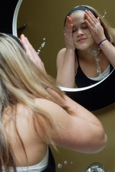 Washing her face