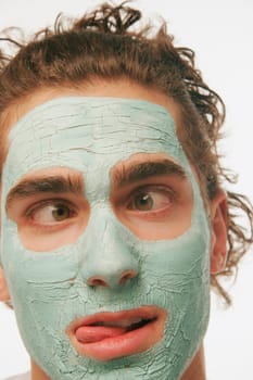 Male with facial masque