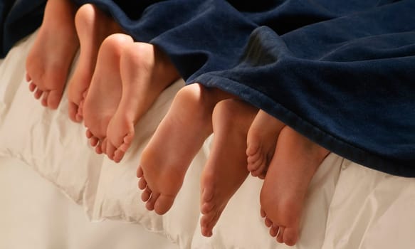Feet in bed