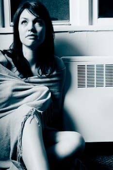 Sitting by a heating vent