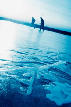 Playing hockey on a frozen lake