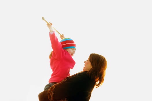 Mother holds child in her arms