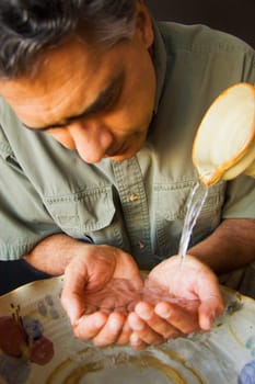 Man washing his hands