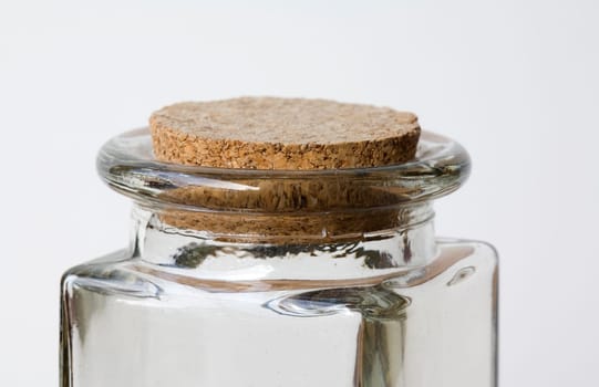 Clear glass jar with cork stopper