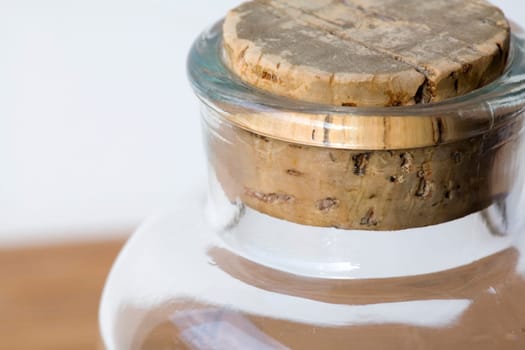 Clear glass jar with cork stopper