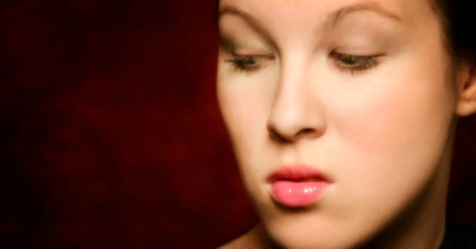 Woman looking down disgusted
