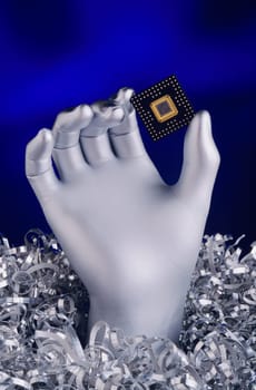 Silver Hand holding Computer Chip