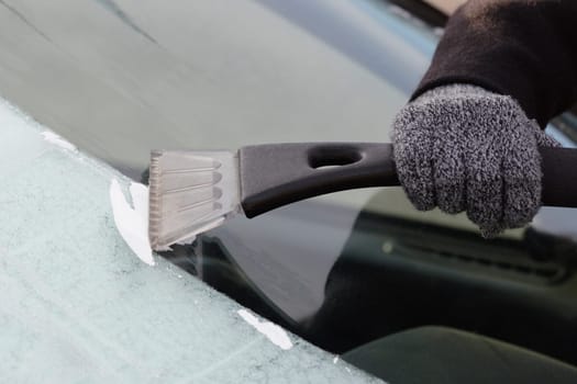 Scraping frost on car window