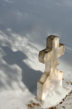 White cross tombstone