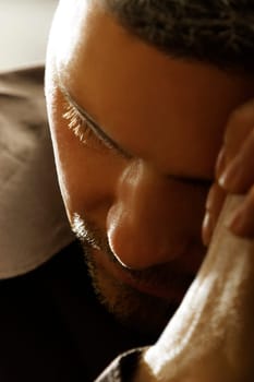 Close up of a man praying