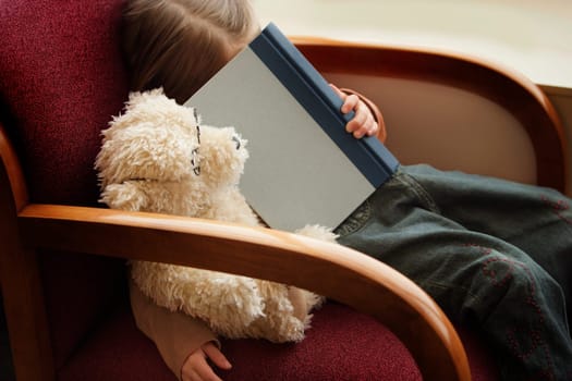 Child falls asleep with book