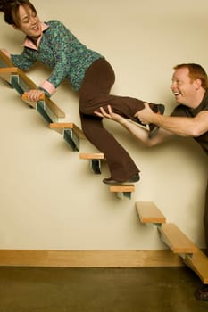Young Couple Playing on stairs