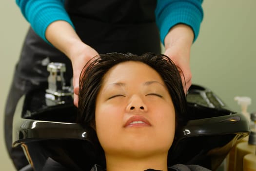 Head massage at the hair salon