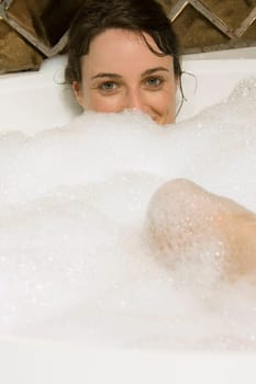 Woman having a bubble bath