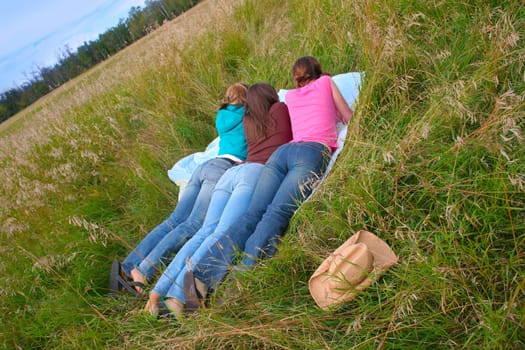 Three teens outdoors