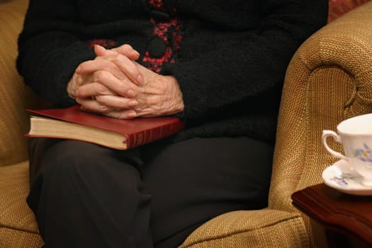 Senior woman in prayer