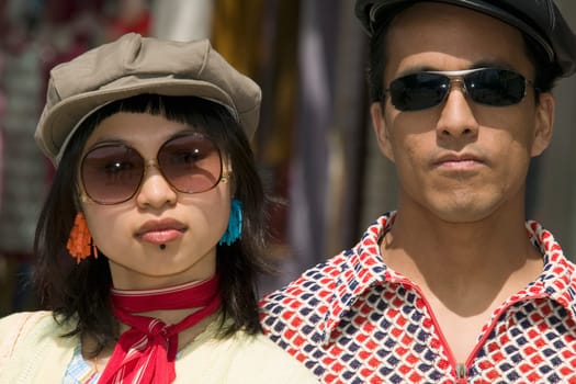 Young couple with sunglasses