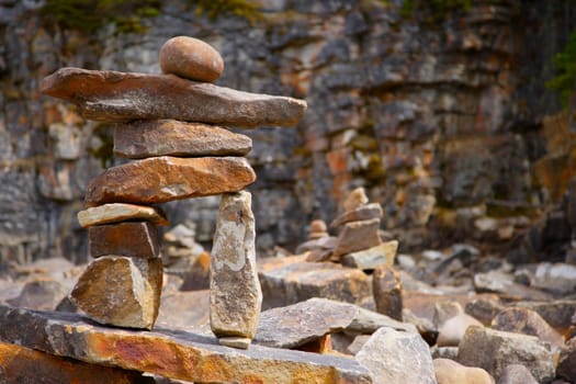 Stone figure among many rocks