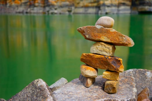 Rock art figure at waters edge