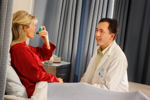 Patient showing doctor inhaler
