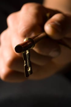 Hand with key