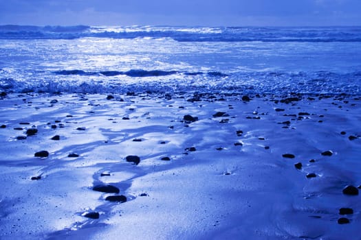 Wet sandy shoreline