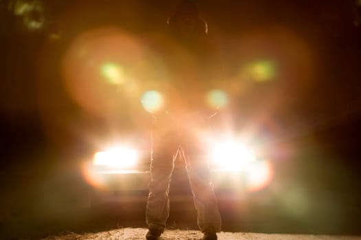 Standing in front of a car