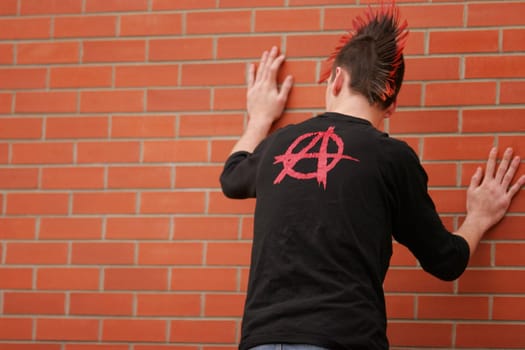 Teenager with mohawk