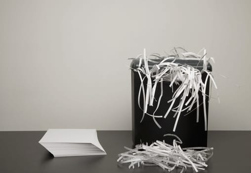 Shredded paper in a garbage can