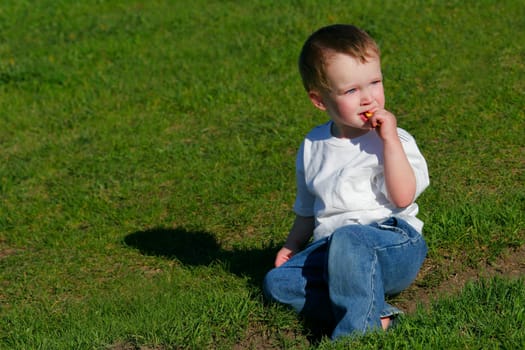 Young boy having a snack