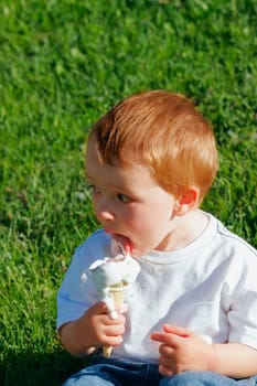 Young boy eating ice cream