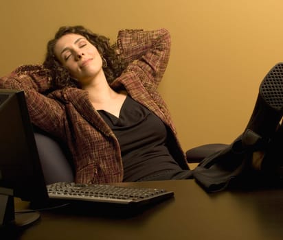 Woman resting at her desk