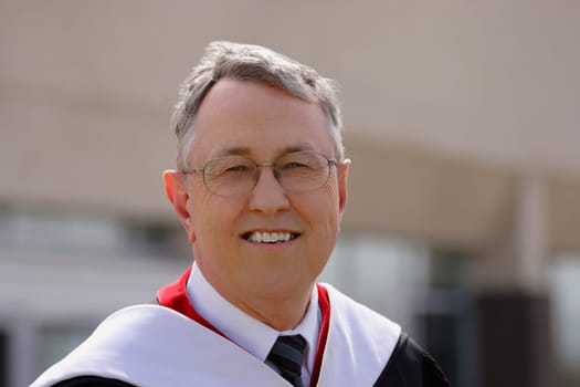 Senior in a graduation gown