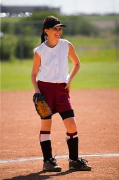 Girl enjoying playing baseball