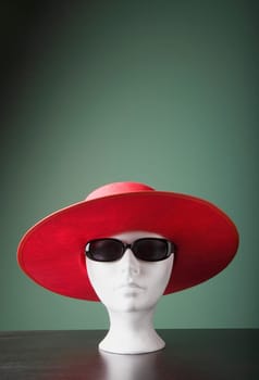 Mannequin in hat and sunglasses