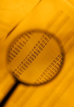 Magnifying glass looking at rates