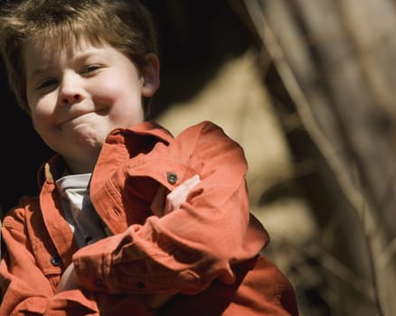 Boy with arms crossed