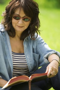 Lady reading in the park