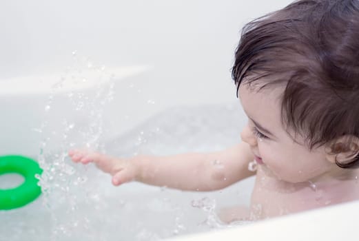 Boy taking a bath