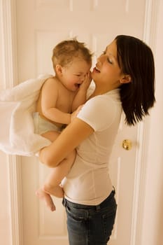 Mother holding boy