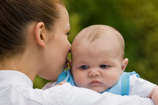 Mother holding baby boy