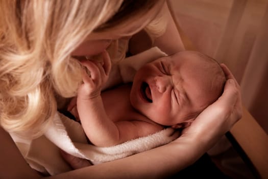Mother soothing a crying baby