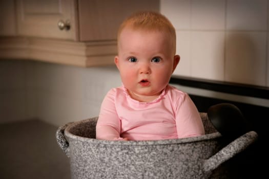 Baby in a large pot